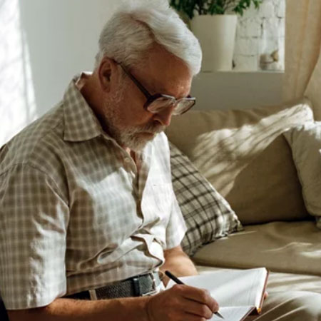 man writing poetry